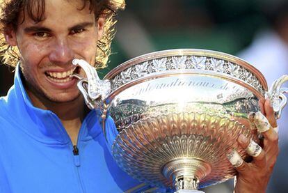 El campeón español, con el trofeo del <i>grande</i> francés.