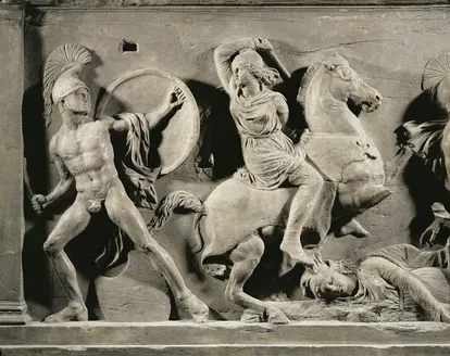 Amazona combatiendo a caballo contra un griego en una metopa clásica.
