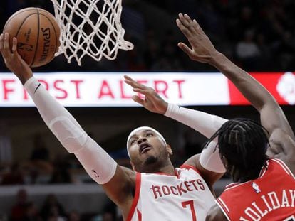 Carmelo Anthony y Holiday, en un Rockets-Bulls, en 2018.