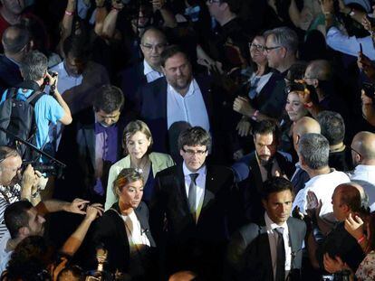 Puigdemont, Forcadell i Junqueras en l'acte d'obertura de la campanya, dijous.