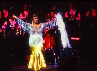 Cuban-American salsa singer Celia Cruz (1925 - 2003) performs at the JVC Jazz Festival concert 'Two Divas and a Lion' at Carnegie Hall, New York, New York, July 1, 1995.
