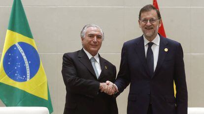 Mariano Rajoy (d), y el presidente brasile&ntilde;o, Michel Temer (i), este jueves en China.