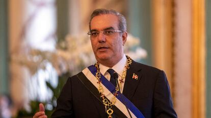 Dominican Republic's President Luis Abinader speaks after awarding Portugal's President Marcelo Rebelo de Sousa (out of frame) with the Order of Merit of Duarte, S�nchez and Mella Grand Cross with Gold Breast Star during his official visit to the country on March 23, 2023. - The visit coincides with the celebration of the XXVIII Ibero-American Summit of Heads of State and Government that will take place on March 24 and 25 in Santo Domingo. (Photo by Erika SANTELICES / AFP)
