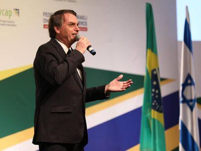 Jair Bolsonaro participa en un foro con empresarios brasileños e israelíes, este martes en Jerusalén.