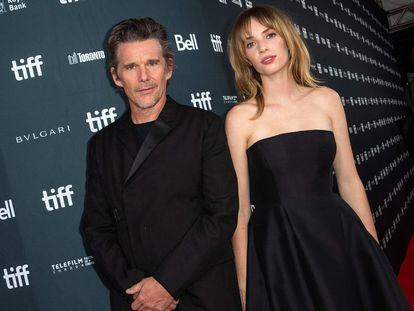 US actor and director Ethan Hawke (L) and his daughter US actress Maya Hawke arrive for the premiere of "Wildcat" during the Toronto International Film Festival (TIFF) at the Royal Alexandra Theatre in Toronto, Ontario, Canada, on September 11, 2023. (Photo by VALERIE MACON / AFP)