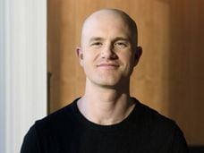 Brian Armstrong, co-founder and chief executive officer of Coinbase Inc., stands for a photograph at the Coinbase Inc. office in San Francisco, California, U.S., on Friday, Dec. 1, 2017. Coinbase wants to use digital money to reinvent finance. In the company's version of the future, loans, venture capital, money transfers, accounts receivable and stock trading can all be done with electronic currency, using Coinbase instead of banks. Photographer: Michael Short/Bloomberg