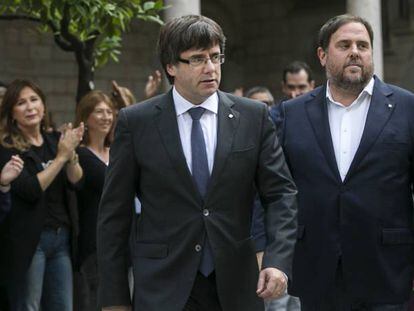 Carles Puigdemont, presidente de la Generalitat, y Oriol Junqueras, vicepresidente.
