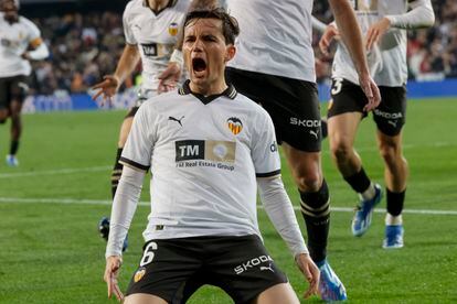 Valencia midfielder Hugo Guillamón celebrates Valencia CF's draw.