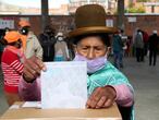 A woman casts her ballot during general elections in La Paz, Bolivia, Sunday, Oct. 18, 2020. (AP Photo/Martin Mejia)