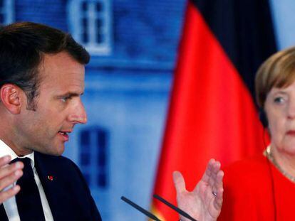 Macron y Merkel pactan la refundación de la zona euro