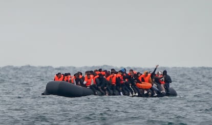 A group of migrants cross the English Channel in a small boat from the coast of France, in August 2023.