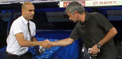 Guardiola (esq.) i Mourinho quan estaven al Ba&ccedil;a i al Madrid, el 2011.