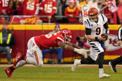 Joe Burrow dodges Chris Jones of the Chiefs during the conference finals on January 30.