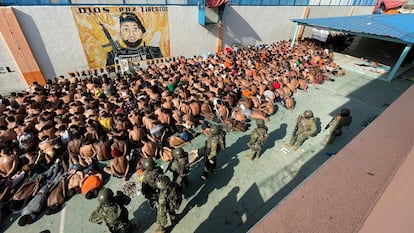 Ecuadorian soldiers guarded a group of inmates in the Guayaquil prison on July 26 after regaining control of the center after several days of clashes between gangs inside.