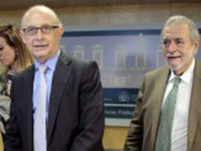 El ministro de Hacienda, Cristóbal Montoro, y el secretario de Estado de Administraciones Públicas, Antonio Beteta.
