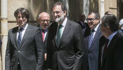 Carles Puigdemont y Mariano Rajoy, líderes de la exCDC y del PP, respectivamente.