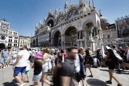 Piazza San Marco, in Venice, crowded with tourists in August 2022. 