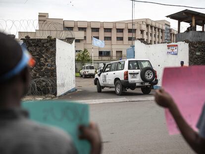 Members of LUCHA ("Lutte pour le changement", Struggle for change) protest in front of the UN peacekeeping mission in DR Congo MONUSCO compound in Goma on November 30, 2019, as failure of UN Peacekeepers to protect civilians from armed groups has led to protests in North Kivu over the past week.