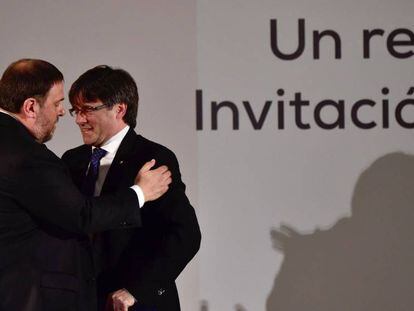El president de la Generalitat, Carles Puigdemont, junt amb Oriol Junqueras.