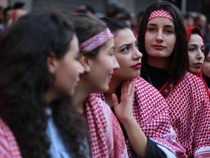 Cuatro jóvenes simpatizantes del Frente Popular de Liberación Palestina participan en una protesta en Gaza el pasado 7 de diciembre. 