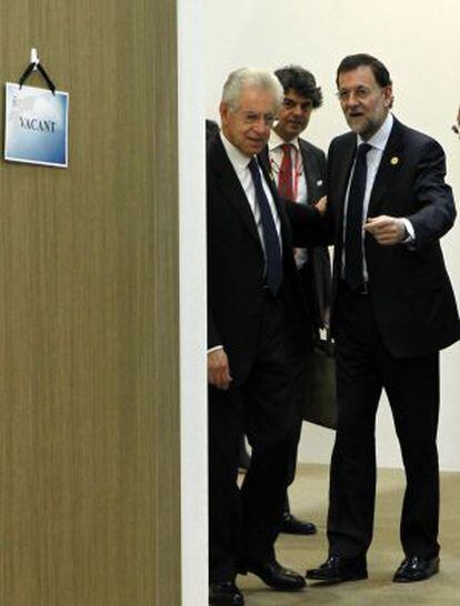 Rajoy junto al Primer Ministro italiano tras la reunión en Seúl.