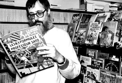 Una persona leyendo un cómic de Edgar Pierre Jacobs en 1992.