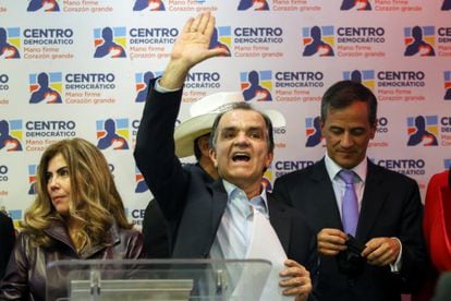 Óscar Iván Zuluaga, chosen presidential candidate of the Democratic Center, celebrates the announcement at the party's headquarters in Bogotá.