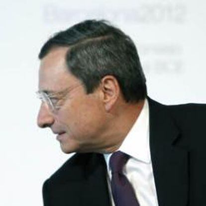 El presidente del Banco de España, Miguel Ángel Fernández Ordóñez, junto al presidente del BCE, Mario Draghi