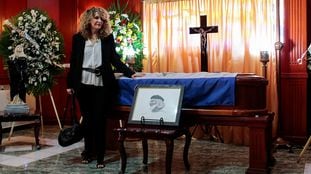 Nicaragua's writer Gioconda Belli stands next to the coffin of Nicaraguan poet and priest Ernesto Cardenal during his funeral service at a mortuary chapel in Managua, Nicaragua March 2, 2020. REUTERS/Oswaldo Rivas