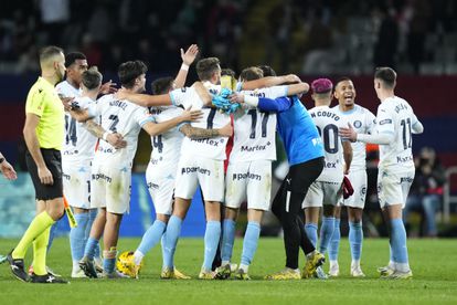 Los jugadores del Girona celebran su victoria ante el Barcelona. 