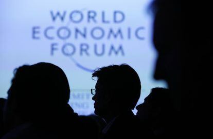 Asistentes al Foro de Davos, en una conferencia.