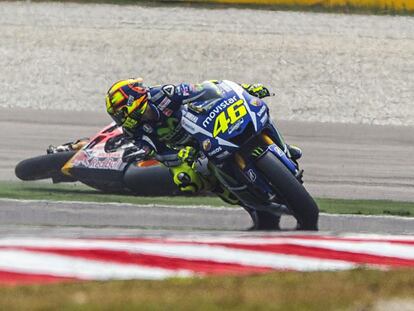 Rossi y Márquez en Sepang el pasado octubre.