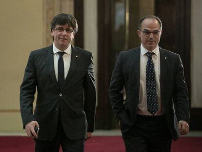 Carles Puigdemont y Jordi Turull.