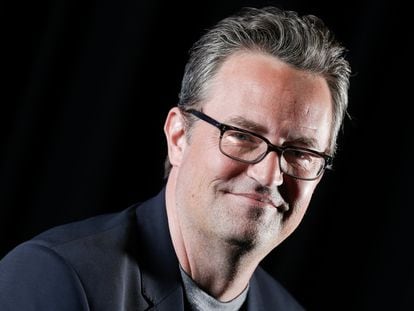 File - Matthew Perry poses for a portrait on Feb. 17, 2015, in New York. Perry, who starred as Chandler Bing in the hit series “Friends,” has died. He was 54. The Emmy-nominated actor was found dead of an apparent drowning at his Los Angeles home on Saturday, according to the Los Angeles Times and celebrity website TMZ, which was the first to report the news. Both outlets cited unnamed sources confirming Perry’s death. His publicists and other representatives did not immediately return messages seeking comment.  (Photo by Brian Ach/Invision/AP)