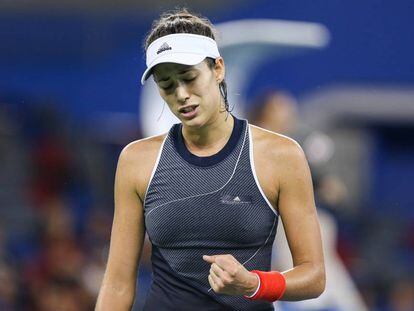 Muguruza celebra un punto durante el partido ante Linette en Wuhan.