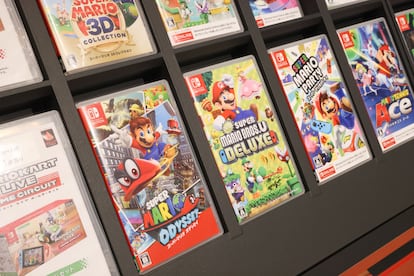 Various Super Mario Nintendo Switch video games on display in a store in Shibuya, Tokyo.