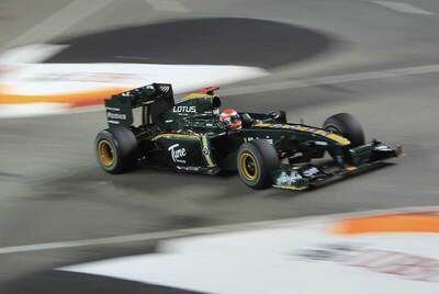 Jarno Trulli, en septiembre pasado, al volante de un bólido de Lotus F-1 Racing durante un entrenamiento para el Gran Premio de Singapur.