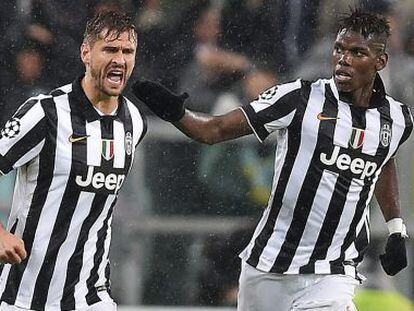 Llorente y Pogba celebran el tercer tanto de la Juve.
