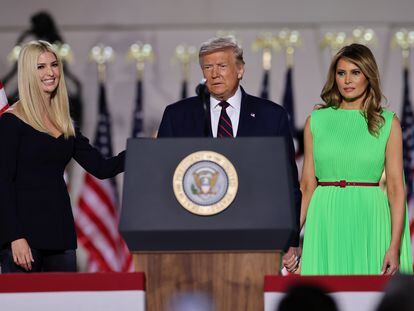 U.S. President Donald Trump looks on alongside to U.S. first lady Melania Trump and White House Senior Adviser Ivanka Trump before delivering his acceptance speech as the 2020 Republican presidential nominee during the final event of the Republican National Convention on the South Lawn of the White House in Washington, U.S., August 27, 2020. REUTERS/Carlos Barria