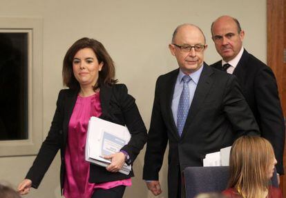 Santamaría, Montoro y Guindos, antes de la rueda de prensa.