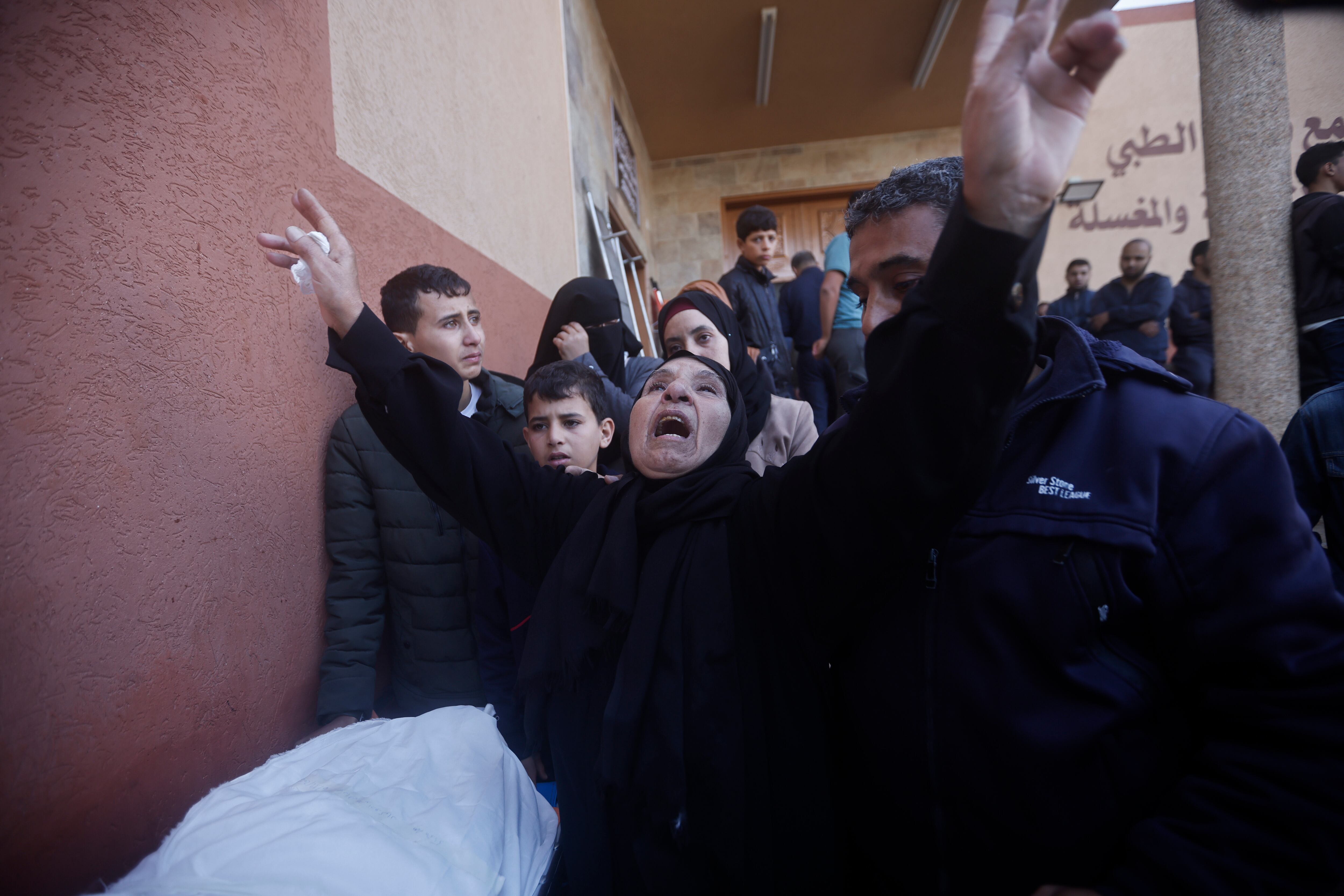 Palestinians attend a funeral of their relatives killed in the Israeli bombardment of the Gaza Strip in Khan Younis, Wednesday, Dec. 6, 2023. (AP Photo/Mohammed Dahman)