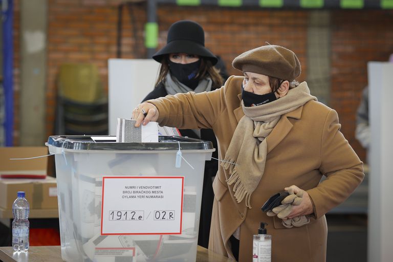 A Kosovar Albanian woman casts her vote at a Pristina polling station this Sunday.