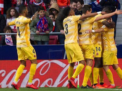 Los jugadores del Girona celebran el gol del empate ante el Atl&eacute;tico, obra de Portu 