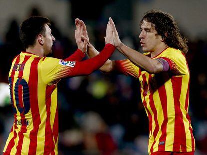 Messi y Puyol celebran el segundo gol ante el Getafe