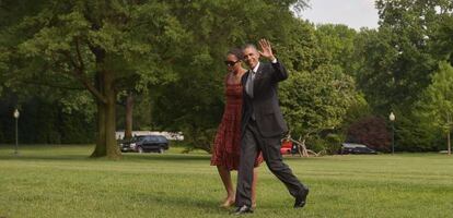 Barack Obama junto a su esposa Michelle, este lunes en Washington.