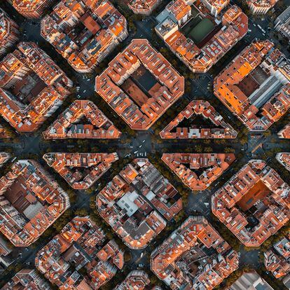 Barcelona's Grid pattern truly comes to life when viewed from above. Definitely one of the most beautiful cities in the world with the Sagrada Familia Cathedral as the crown. The grid was created by Ildefons Cerdà a Spanish architect to solve Barcelona's health and overcrowding problems of the 19th century.