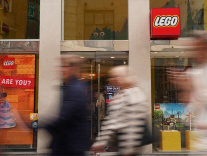 People pass a Lego store in Copenhagen, Denmark August 29, 2023. REUTERS/Tom Little
