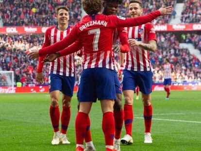 Thomas felicita a Griezmann, autor del 1-0 al Getafe tras aprovechar un pase del ghanés.