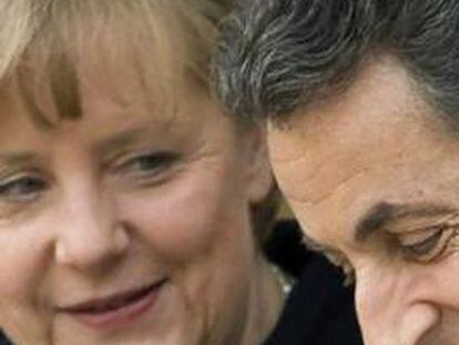 Merkel y Sarkozy, al terminar su rueda de prensa del 5 de diciembre