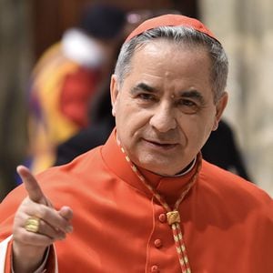 Newly elevated cardinal, Giovanni Angelo Becciu from Italy, attends the courtesy visit of relatives following a consistory for the creation of new cardinals on June 28, 2018 in the Apostolic Palace at St Peter's Basilica in Vatican. (Photo by ANDREAS SOLARO / AFP) (Photo by ANDREAS SOLARO/AFP via Getty Images)